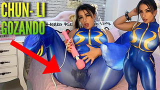 Charming cosplay chick dressed as Chun Li from street fighter playing with her htachi vibrator climax and soaking her panties and pants ahegao
