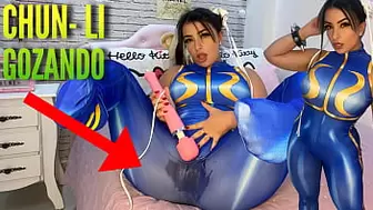 Charming cosplay chick dressed as Chun Li from street fighter playing with her htachi vibrator climax and soaking her panties and pants ahegao