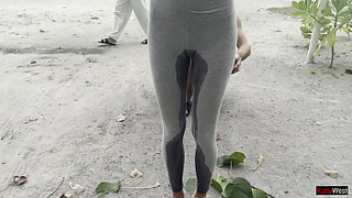 Crazy bitch wetting her leggings in public