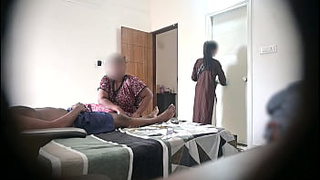 Flashing prick infront of 2 maids when taking massage